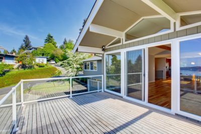 Balcony,House,Exterior,With,Glass,Railings,And,Perfect,View.